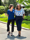 Miik founder Donna and model Kimesha smiling both wearing Miik's Akira tulip hem capri pant 