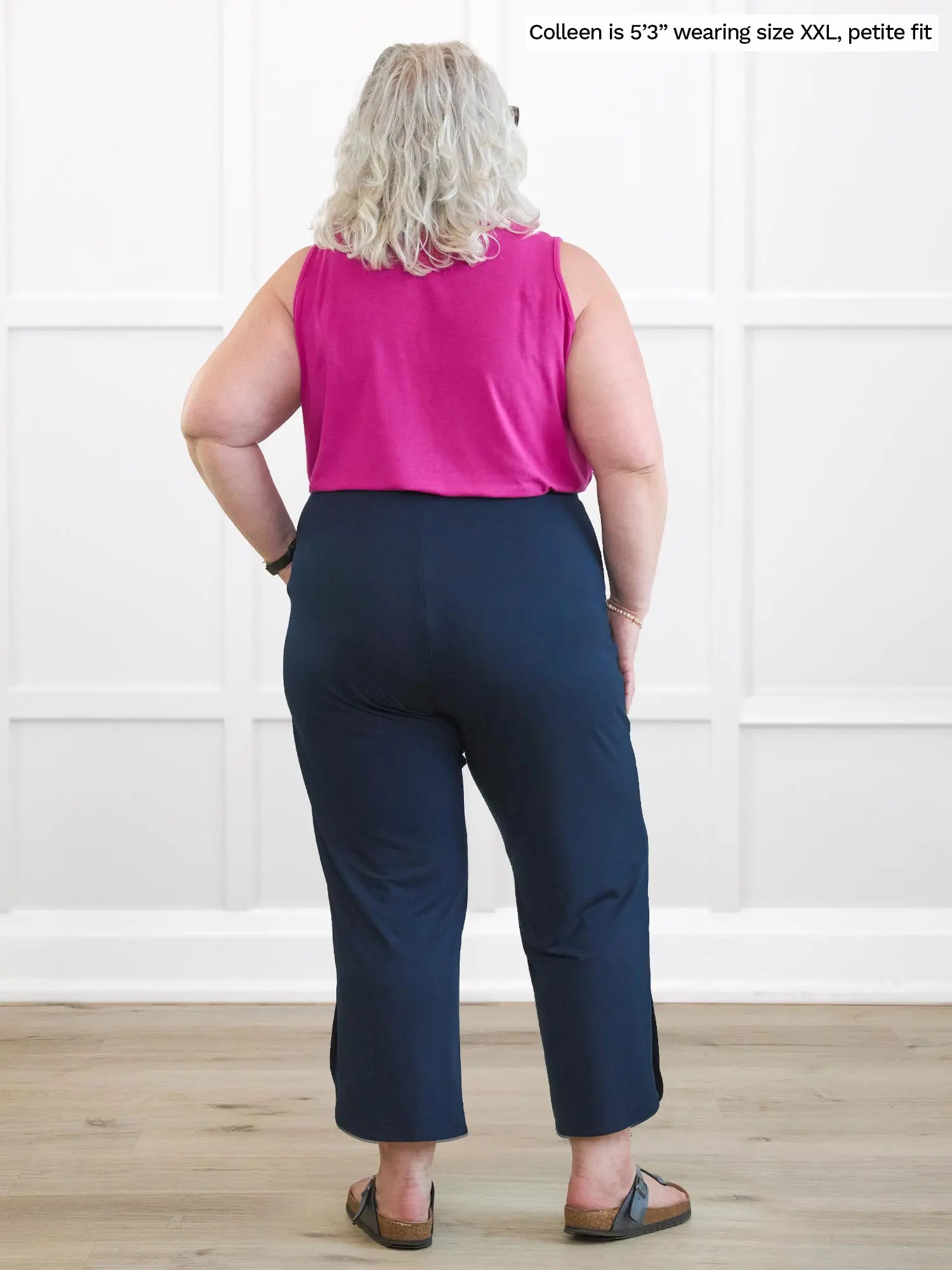 Miik model Colleen (5’3”, xxlarge) standing with her back towards the camera showing the back of Miik&