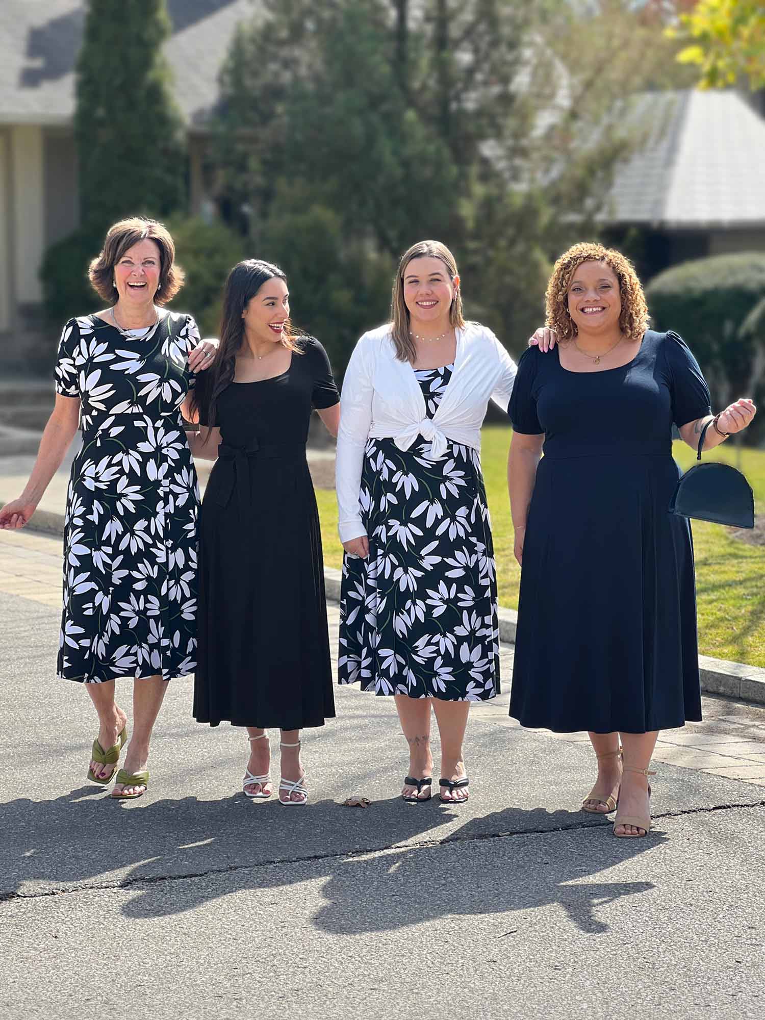 Miik models Yasmine, Christal and Carley along with founder Donna standing next to each other laughing wearing Miik&