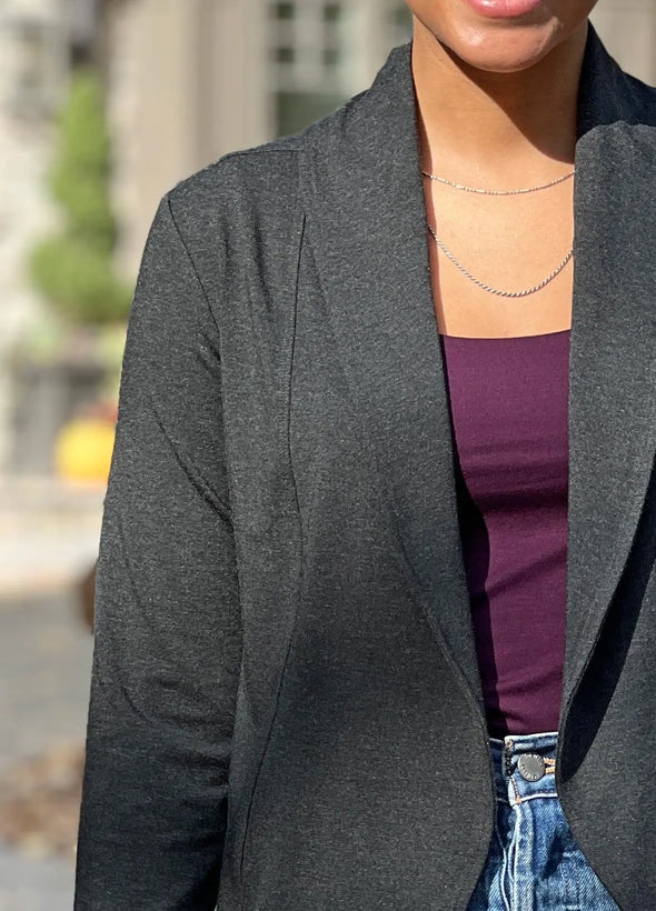 A close up image of the Miik's Anne soft stretch blazer in charcoal #color_charcoal 