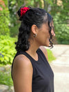 Miik model wearing Miik's Anvi hair scrunchie set in poppy red #color_poppy-red