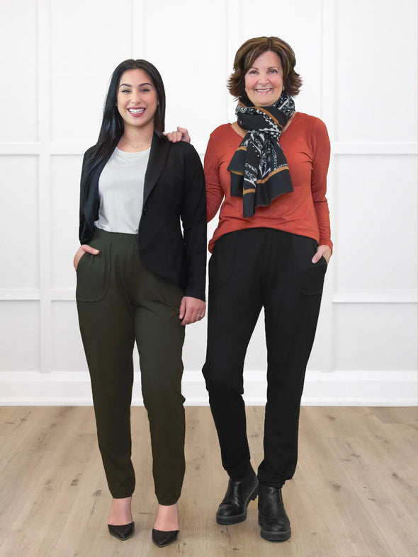 Miik model Yasmine and founder Donna both wearing Miik's Ashton patch pocket jogger. Yasmine is wearing on olive with a white tee and blazer, while Donna is wearing with a long sleeve top in paprika melange an a scarf