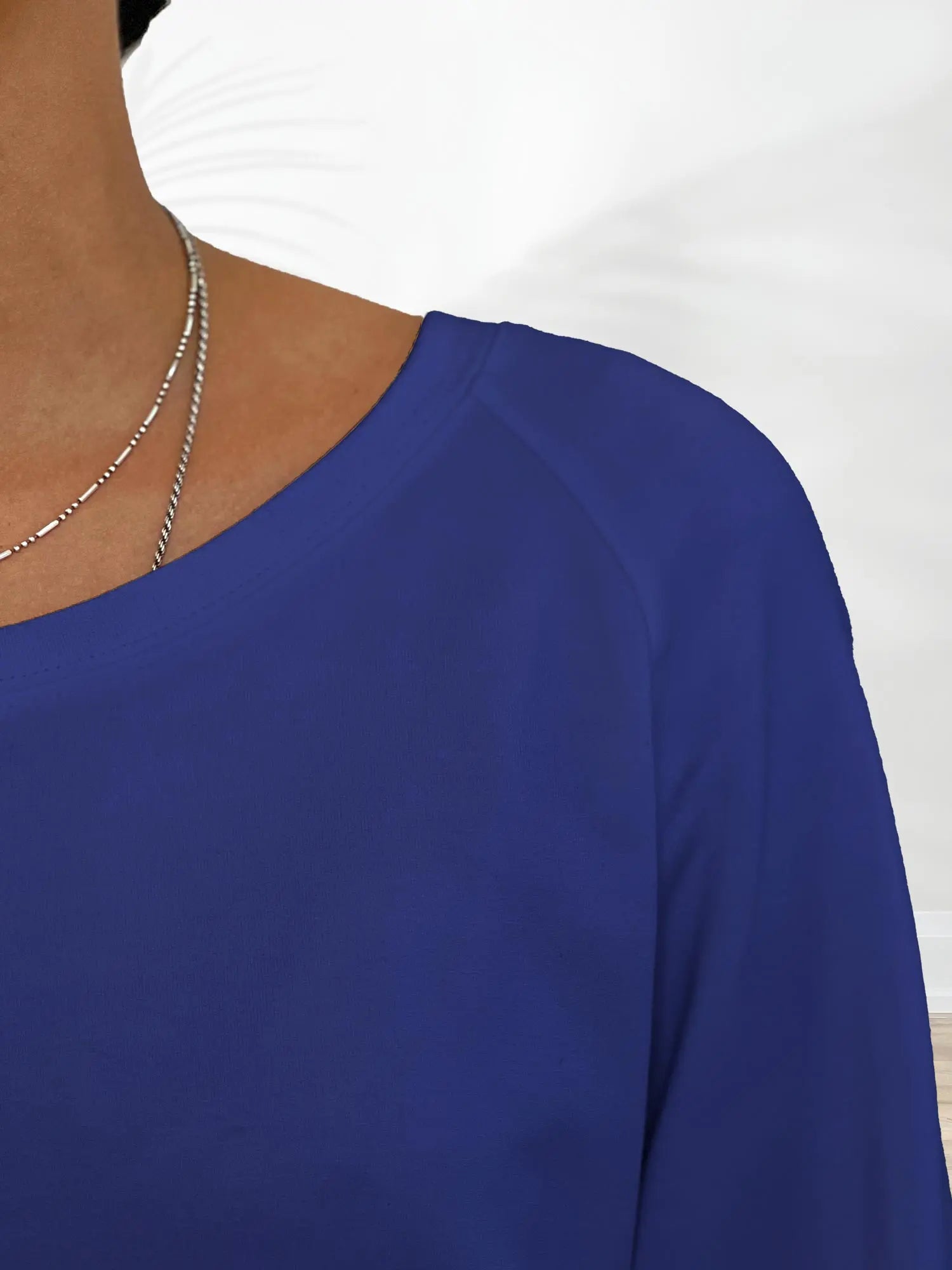 A closeup image of the neckline of Miik&