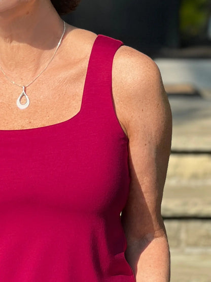 A close up shot of  te square neckline of the Miik&