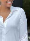 A closeup image of the collared shirt Miik's Inna long sleeve button up shirt in white 
#color_white 