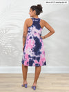 Miik model Meron (5’3”, xsmall) standing with her back towards the camera showing the back of Miik's Jackie french terry tank dress in northern lights tie dye print #color_northern-lights 