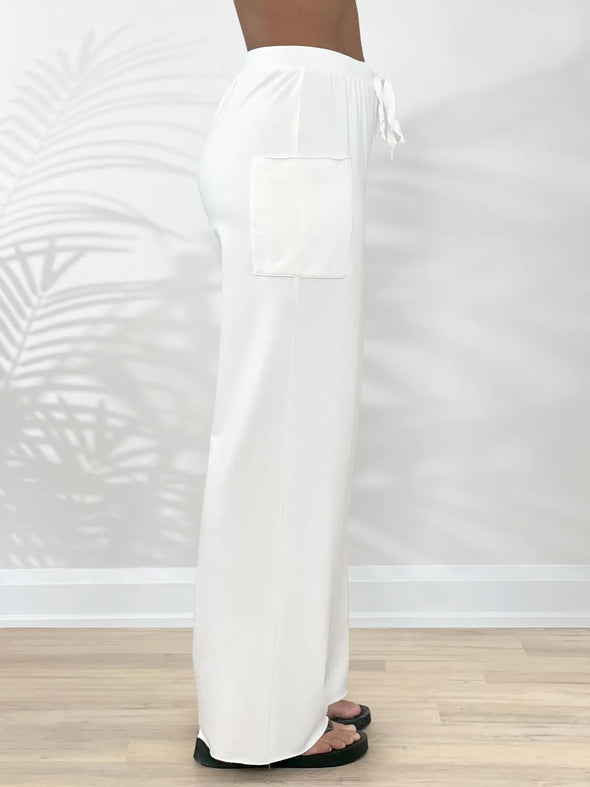 A side closeup of Miik's Kimber french terry wide leg lounge pant in natural #color_natural