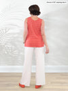 Miik founder Donna (5’6”, small) standing with her back towards the camera showing the back of Miik's Kimber french terry wide leg lounge pant in natural #color_natural