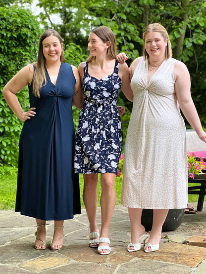 Miik models Christal, Jo and Bri standing next to each other, smiling and all wearing Miik styles. Christal is wearing Miik&