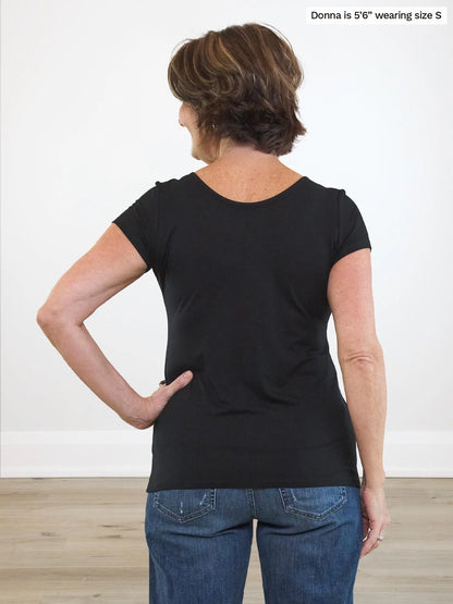 Miik founder Donna (5’6”, small) standing with her back towards the camera showing the back of Miik&