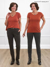 Miik founder Donna (5'6", small) smiling while wearing Miik's Marianna reversible classic tee in paprika melange with a charcoal pants. Donna is wearing the Marianna tee in both necklines to show the difference between the rounded v-neck to scoop neckline
#color_paprika-melange 