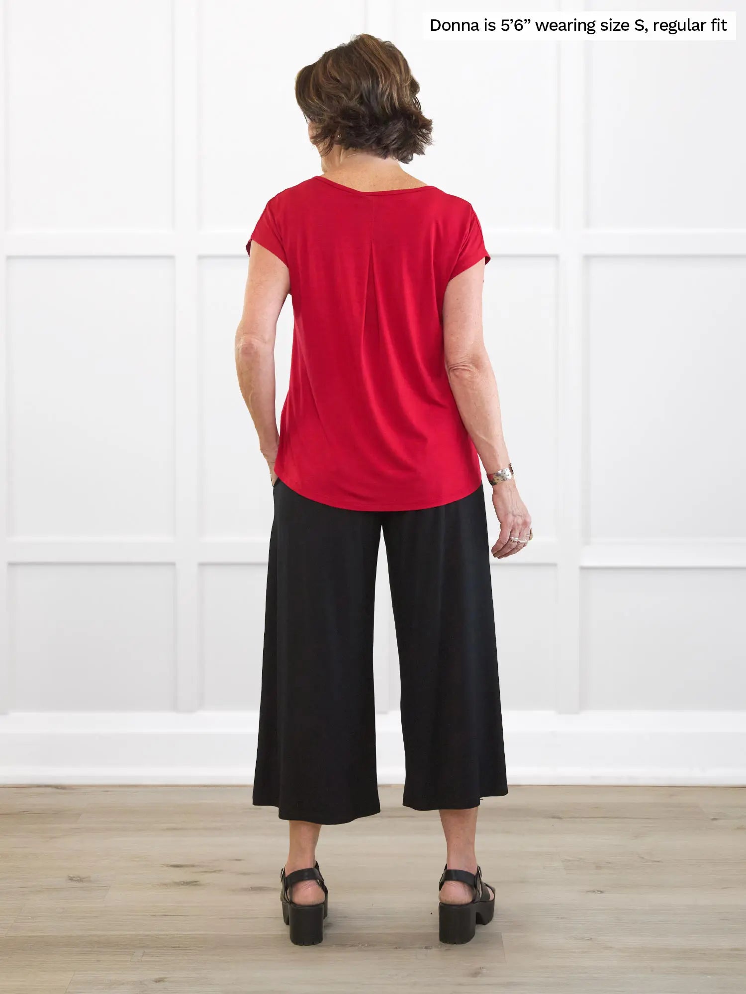 Miik founder Donna (5’6”, small) standing with her back towards the camera showing the back of Miik&