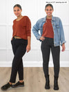 Miik model Meron (5'3", xsmall) showing ways to style the Miik's Miik's Rosalie long sleeve dolman sweater in chestnut. Left version is wearing with a dress pant in black and a brown belt, while the right version she dressed with a charcoal legging and an oversized denim jacket and boots 
#color_chestnut