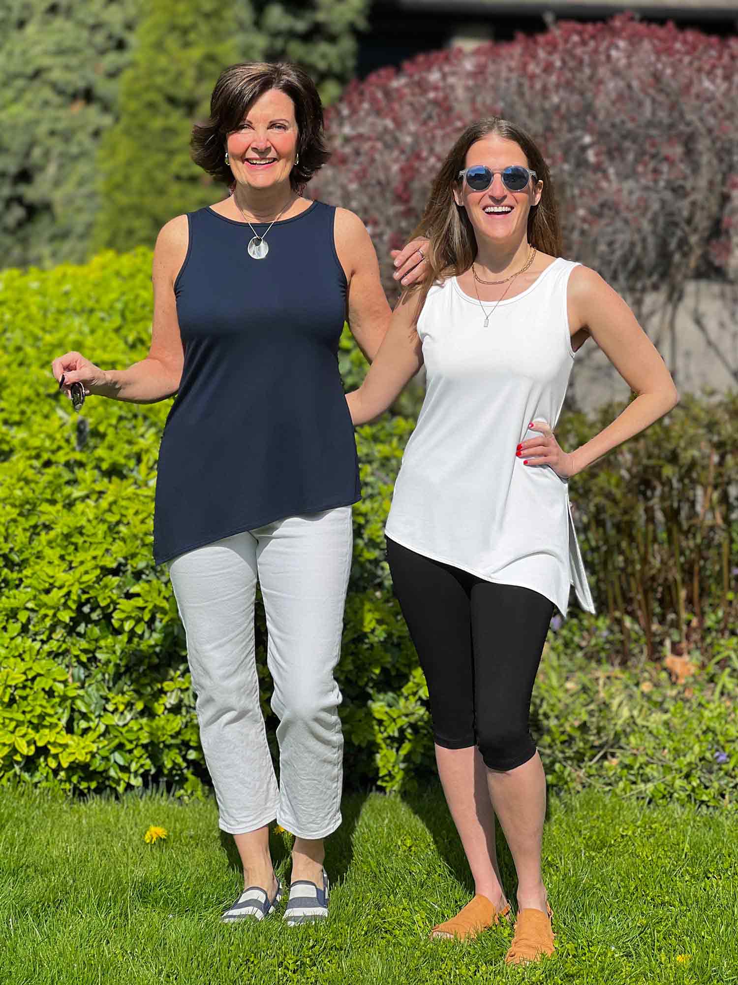 Miik founder Donna and model Lex standing next to each other smiling both wearing Miik&