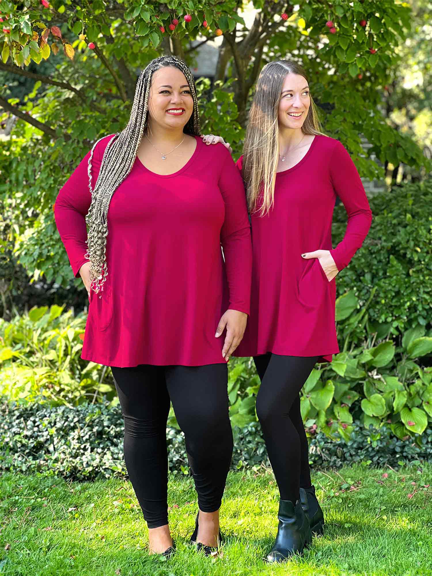 Miik models Sarita and Jo standing next to each other looking away both wearing the same outfit: Miik&