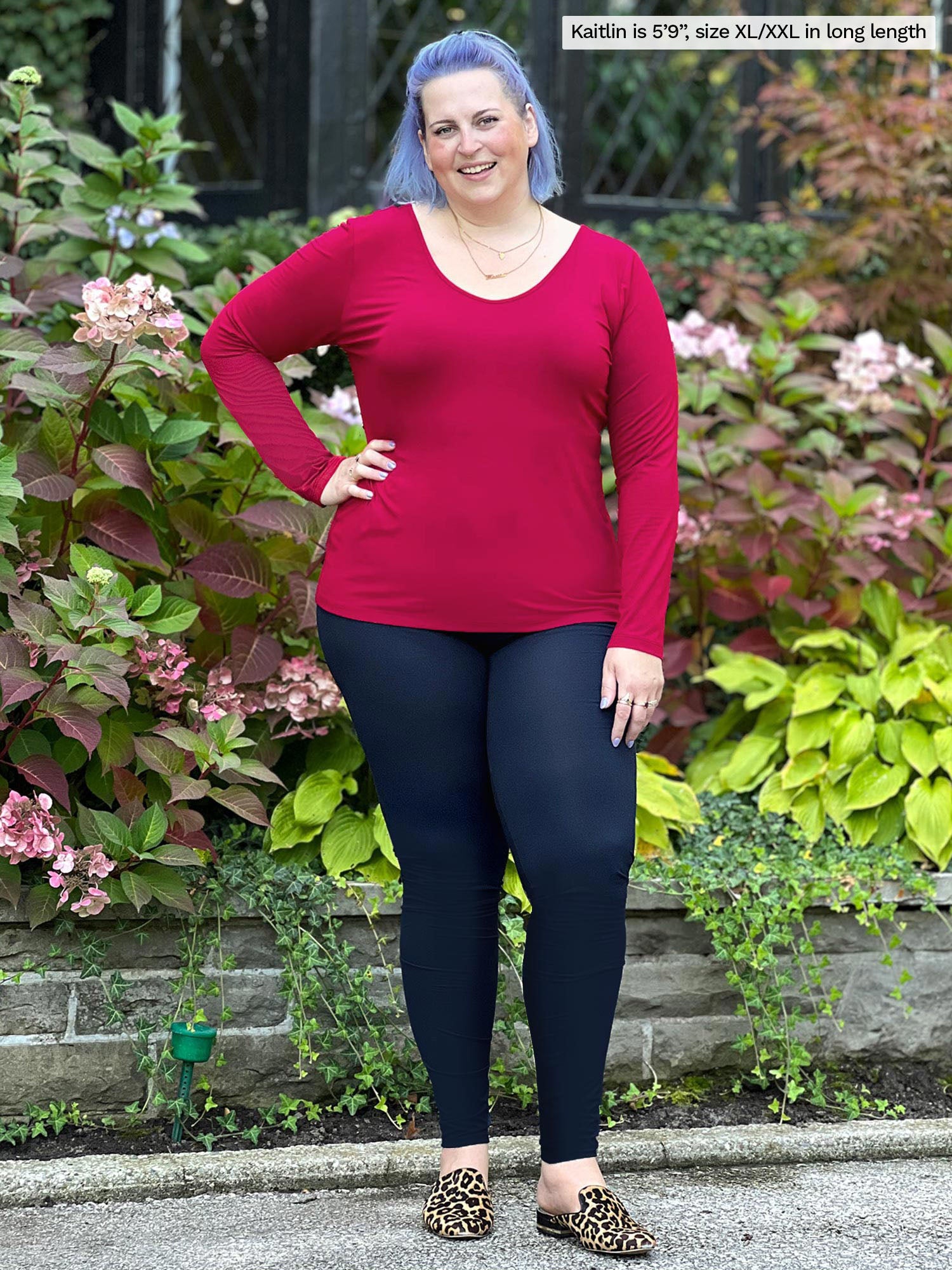 Woman standing in front of plants wearing Miik&